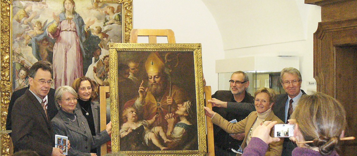 Förderer übergeben ein Gemälde von Bischof Sintpert, gemalt von Johann Baptist Baader